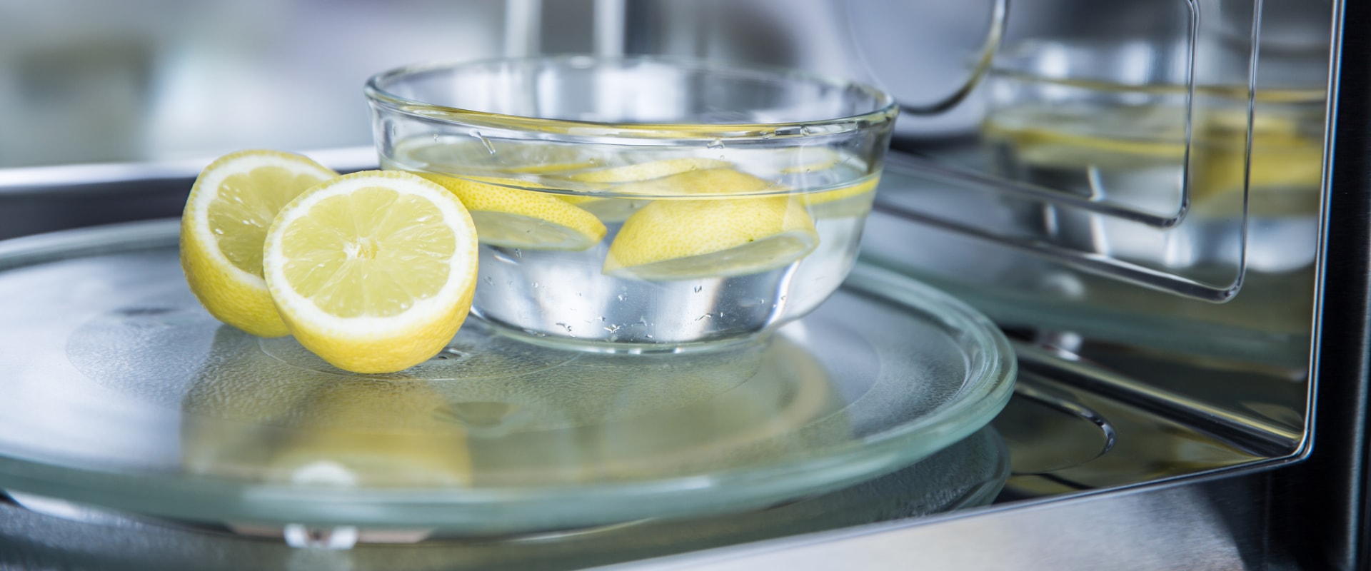 Is lemon or vinegar better for cleaning microwave?