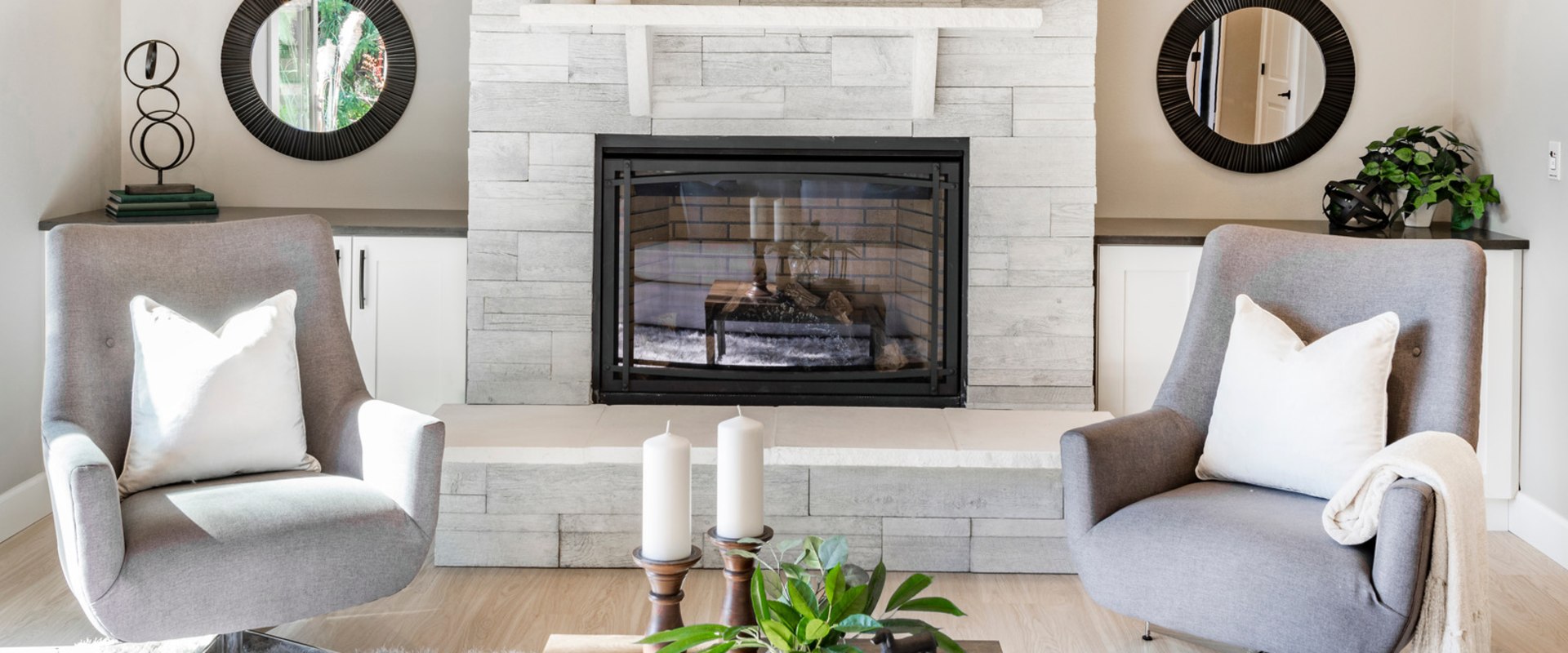 What are some tips for decorating a house with mirrors and reflective surfaces?